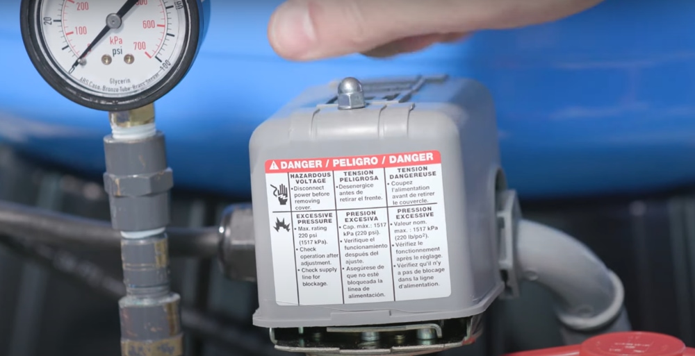 The pressure switch is located on the pump or on the discharge of the diaphragm tank.
